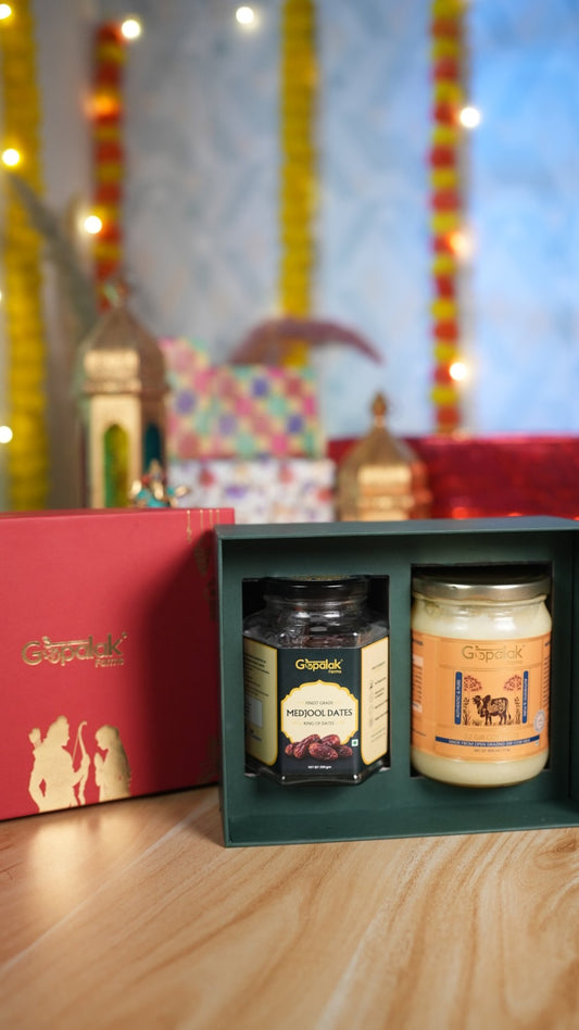 Madhur Milan Hamper with premium dates and A2 Gir cow ghee in a green gift box